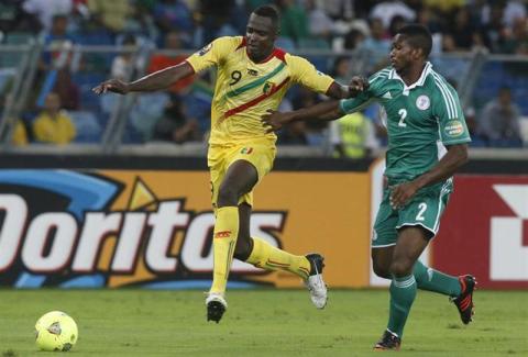 Nigeria's Joseph Yobo (R) vies for the ball against Mali's Cheick Tidiane Diabate during their African Cup of Nations (AFCON 2013) semi-final soccer match at the Moses Mabhida stadium in Durban