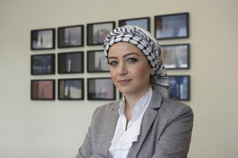 Syrian journalist Zaina Erhaim poses for a portrait at the office of Index on Censorship, an NGO that promotes and defends the right to freedom of expression, in London, Britain, April 13, 2016. PHOTO BY REUTERS/Tristan Martin