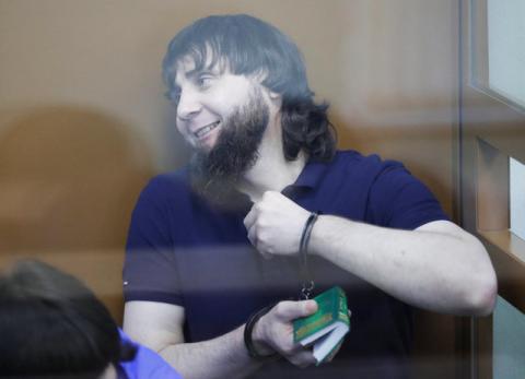 Zaur Dadayev, convicted of involvement in the killing of Russian opposition leader Boris Nemtsov, sits inside the defendants' cage during his sentencing hearing at the Moscow military district court, Russia, July 13, 2017. PHOTO BY REUTERS/Tatyana Makeyeva