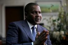 Founder and Chief Executive of the Dangote Group Aliko Dangote gestures during an interview with Reuters in his office in Lagos, Nigeria, June 13, 2012. PHOTO BY REUTERS/Akintunde Akinleye