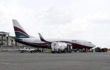 A Boeing 737-7BD Arik Air aeroplane is seen parked on the tarmac at the local airport in Lagos. PHOTO BY REUTERS/Akintunde Akinleye