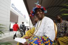 A local traditional chief is seen at the PLAYCE mall housing the French supermarket Carrefour after its inauguration by Ivory Coast's President Alassane Ouattara in Abidjan, Ivory Coast, December 18, 2015. PHOTO BY REUTERS/Thierry Gouegnon