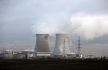 Steam billows from the cooling towers of the Doel nuclear plant of Electrabel, the Belgian unit of French company Engie, former GDF Suez, in Doel near Antwerp, Belgium, January 4, 2016. PHOTO BY REUTERS/Francois Lenoir