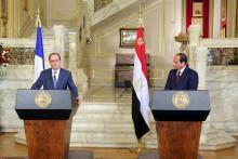 Egyptian President Abdel Fattah al-Sisi (R) and his French counterpart Francois Hollande attend a news conference following their meeting at al-Quba Presidential Palace, in Cairo, Egypt April 17, 2016. PHOTO BY REUTERS/The Egyptian Presidency