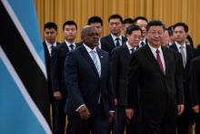 China's President Xi Jinping (R) and President of Botswana Mokgweetsi Masisi arrive for the welcome ceremony at the Great Hall of the People in Beijing, China, August 31, 2018. PHOTO BY REUTERS/Roman Pilipey/Pool