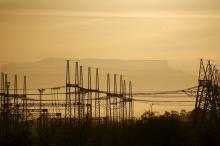 Pylons carry electricity from South African power utility Eskom's Koeberg nuclear plant near Cape Town, November 28, 2015. PHOTO BY REUTERS/Mike Hutchings