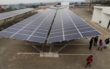Delegates are pictured during the launch event of a solar carport at the Garden City shopping mall in Kenya's capital Nairobi, September 15, 2015. PHOTO BY REUTERS/Thomas Mukoya