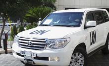 A U.N. vehicle carrying a team of United Nations chemical weapons experts