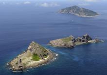 A group of disputed islands, Uotsuri island (top), Minamikojima (bottom) and Kitakojima, known as Senkaku in Japan and Diaoyu in China