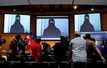 A video of Aaron Driver is projected on a screen during a news conference at the Royal Canadian Mounted Police (RCMP) headquarters in Ottawa, Ontario, Canada, August 11, 2016. PHOTO BY REUTERS/Chris Wattie