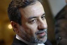 Iran's top nuclear negotiator Abbas Araqchi talks to journalists after meeting senior officials from the United States, Russia, China, Britain, Germany and France in a hotel in Vienna, Austria, October 19, 2015. PHOTO BY REUTERS/Heinz-Peter Bader