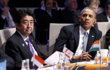 U.S. President Barack Obama (R) and Japan's Prime Minister Shinzo Abe attend the opening session of the Nuclear Security summit (NSS) in The Hague