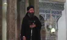 A man purported to be the reclusive leader of the militant Islamic State Abu Bakr al-Baghdadi has made what would be his first public appearance at a mosque in the centre of Iraq's second city, Mosul, according to a video recording posted on the Internet on July 5, 2014, in this still image taken from video. PHOTO BY REUTERS/Social Media Website via Reuters TV