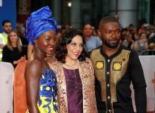 Actress Lupita Nyong'o (L) and David Oyelow (R) stand with director Mira Nair as they arrives on the red carpet for the film "Queen of Katwe" arrive on the red carpet for the film "Queen of Katwe" during the 41st Toronto International Film Festival (TIFF), in Toronto, Canada, September 10, 2016. PHOTO BY REUTERS/Mark Blinch