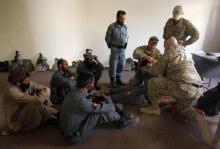 U.S. military advisors for NATO Training Mission-Afghanistan (NTM-A) conduct Combat First Aid lessons with Afghan policemen inside a police station in Khas Konar district in Kunar province, eastern Afghanistan