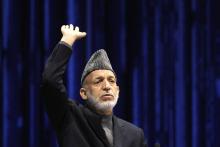 Afghan President Hamid Karzai speaks during the last day of the Loya Jirga, in Kabul