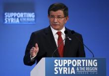 Turkish Prime Minister Ahmet Davutoglu speaks at the donors Conference for Syria in London, Britain, February 4, 2016. PHOTO BY REUTERS/Dan Kitwood