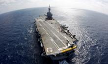 France's flagship Charles de Gaulle aircraft carrier patrols in the Mediterranean, March 26, 2011. PHOTO BY REUTERS/Benoit Tessier