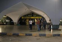 Members of the Zintan city forces stand at Tripoli International Airport