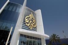 The Al Jazeera Media Network logo is seen on its headquarters building in Doha, Qatar, June 8, 2017. PHOTO BY REUTERS/Naseem Zeitoon