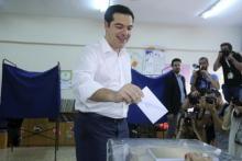 Greek Prime Minister Alexis Tsipras votes at a polling station in Athens, Greece, July 5, 2015. PHOTO BY REUTERS/Alkis Konstantinidis