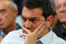 Greek Prime Minister Alexis Tsipras attends a meeting at the Agriculture Ministry in central Athens, Greece, August 5, 2015. PHOTO BY REUTERS/Yiannis Kourtoglou