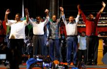 Kenyan opposition leaders (L-R), Musalia Mudavadi, Kalonzo Musyoka, Raila Odinga, Moses Wetangula and Nick Salat hold hands as they announce their alliance during the 2017 general elections aspirants conference organised by the opposition parties in the capital Nairobi, Kenya, January 11, 2017. PHOTO BY REUTERS/Thomas Mukoya