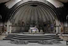 An altar of a damaged church is seen in the town of Qaraqosh, south of Mosul, Iraq, April 11, 2017. PHOTO BY REUTERS/Marko Djurica
