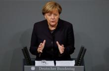 German Chancellor Angela Merkel addresses a session of the German lower house of parliament, the Bundestag, in Berlin, Germany, November 25, 2015. PHOTO BY REUTERS/Fabrizio Bensch