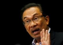 Malaysia's opposition leader Anwar Ibrahim speaks to the media in Kuala Lumpur, February 4, 2015. PHOTO BY REUTERS/Olivia Harris