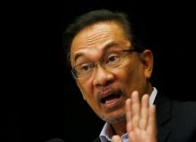Malaysia's opposition leader Anwar Ibrahim speaks to the media in Kuala Lumpur, February 4, 2015. PHOTO BY REUTERS/Olivia Harris