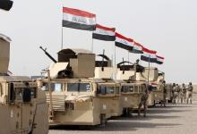 Iraqi security forces ride in vehicles travelling to Mosul to fight against militants of Islamic State at an Iraqi army base in Camp Taji in Baghdad, February 21, 2016. PHOTO BY REUTERS/Ahmed Saad