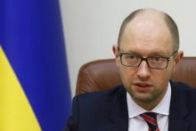 Ukrainian Prime Minister Arseny Yatseniuk speaks during a government meeting in Kiev, Ukraine, November 25, 2015. PHOTO BY REUTERS/Valentyn Ogirenko