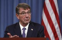 U.S. Defense Secretary Ash Carter speaks during a joint news conference following a meeting with his British counterpart Michael Fallon at the Pentagon in Washington, December 11, 2015. PHOTO BY REUTERS/Kevin Lamarque