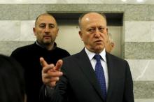 Lebanon's Justice Minister Ashraf Rifi gestures upon his arrival to attend a Cabinet session at the government palace in Beirut, January 22, 2015. PHOTO BY REUTERS/Mohamed Azakir
