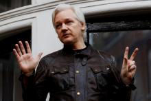  WikiLeaks founder Julian Assange is seen on the balcony of the Ecuadorian Embassy in London, Britain, May 19, 2017. PHOTO BY REUTERS/Peter Nicholls