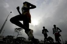 Athletes run during the Nairobi Marathon. PHOTO BY REUTERS/Antony Njuguna
