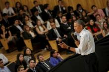 President Obama listen a question from the audience during a town hall meeting with entrepreneurs as part of Obama's two-day visit to Argentina, in Buenos Aires. PHOTO BY REUTERS/Carlos Barria