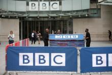 BBC workers place barriers near to the main entrance of the BBC headquarters and studios in Portland Place, London, Britain, July 16, 2015. PHOTO BY REUTERS/Peter Nicholls