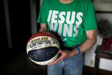 Former North Korean detainee Jeffrey Fowle holds a basketball he brought to North Korea at this home in Dayton, Ohio,U.S., May 4, 2018. PHOTO BY REUTERS/Maddie McGarvey
