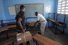 Workers store boxes of electoral material in a polling station in Port-au-Prince, Haiti, October 24, 2015. PHOTO BY  REUTERS/Andres Martinez Casares