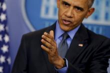 U.S. President Barack Obama gestures as he holds his end of the year news conference at the White House in Washington, December 18, 2015. PHOTO BY REUTERS/Carlos Barria