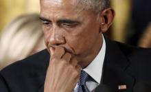 U.S. President Barack Obama reacts while talking about Newtown and other mass killings during an event held to announce new gun control measures at the White House in Washington, January 5, 2016. PHOTO BY REUTERS/Kevin Lamarque