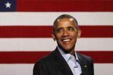 U.S. President Barack Obama smiles as he delivers remarks to supporters at a Democratic National Committee (DNC) event at Gilley's Club in Dallas, Texas, March 12, 2016. PHOTO BY REUTERS/Jonathan Ernst