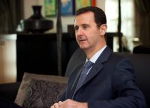 Syria's President Bashar al-Assad is seen during an interview with the American magazine Foreign Affairs published in Damascus, January 26, 2015. PHOTO BY REUTERS/SANA