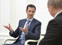 Syrian President Bashar al-Assad speaks during a meeting with Russian President Vladimir Putin at the Kremlin in Moscow, Russia, October 20, 2015. PHOTO BY REUTERS/Alexei Druzhinin