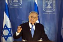 Israel's Prime Minister Benjamin Netanyahu speaks during a handover ceremony at the prime minister's office in Jerusalem, in which the new Chief of Staff Lieutenant-General Gadi Eizenkot replaced outgoing Chief of Staff Lieutenant-General Benny Gantz, February 16, 2015. PHOTO BY REUTERS/Ronen Zvulun