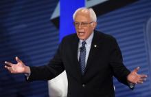U.S. Democratic presidential candidate Bernie Sanders answers a question from the audience while taking part in a CNN Democratic Town Hall moderated by American journalist and CNN anchor Anderson Cooper (unseen) in Derry, New Hampshire, February 3, 2016. PHOTO BY REUTERS/Rick Wilking