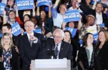 Democratic U.S. presidential candidate Bernie Sanders smiles after winning, at his 2016 New Hampshire presidential primary night rally in Concord, New Hampshire, February 9, 2016. PHOTO BY REUTERS/Rick Wilking