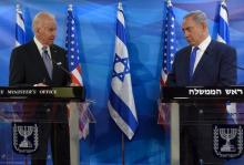 U.S. Vice President Joe Biden (L) and Israeli Prime Minister Benjamin Netanyahu look at each other as they deliver joint statements during their meeting in Jerusalem, March 9, 2016. PHOTO BY REUTERS/Debbie Hill